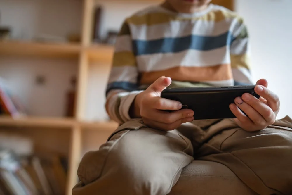 Kids addicted to their phones can be helped by inviting them to play board games!